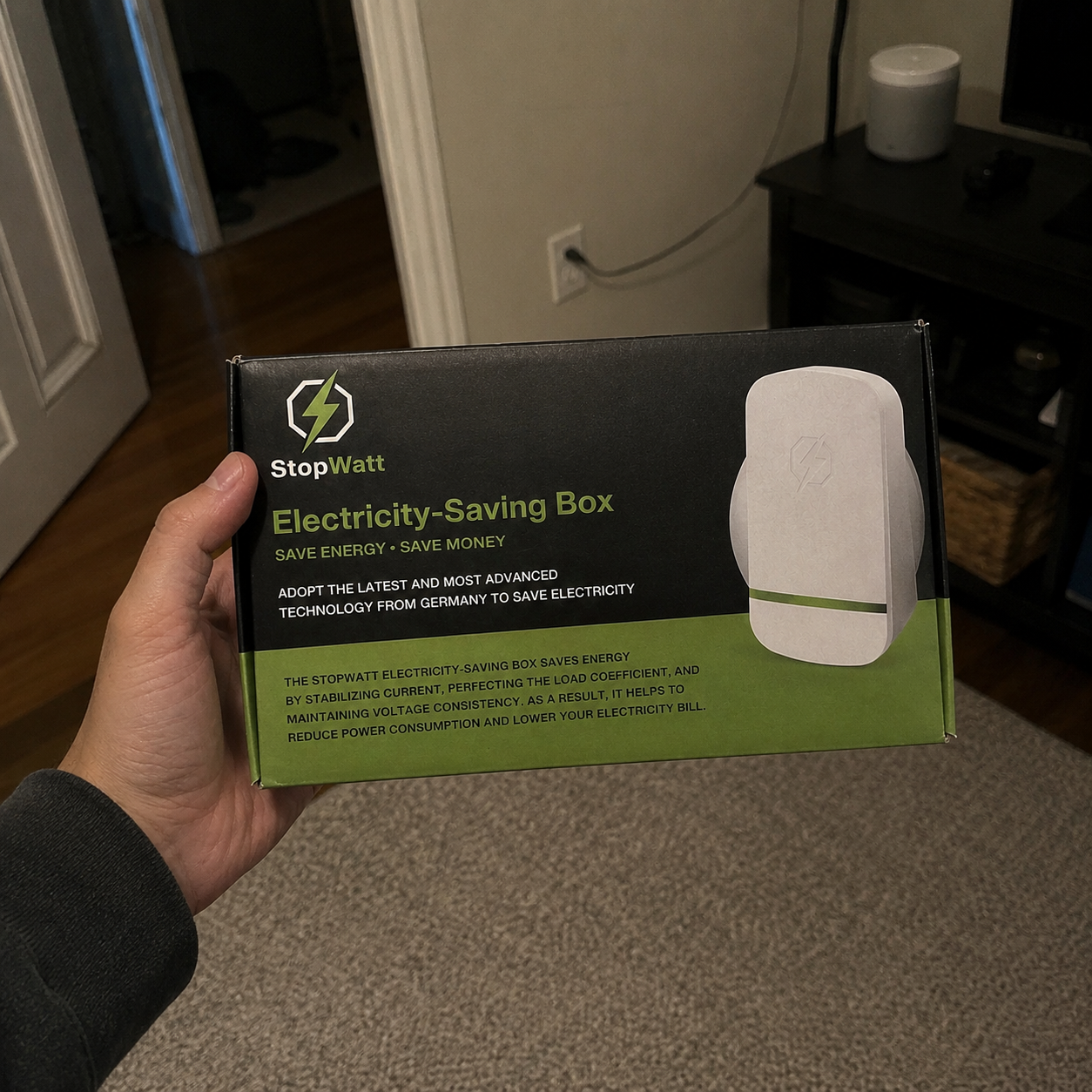 StopWatt device plugged into a wall outlet